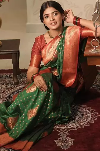 Green silk blend banarasi saree with unstitched blouse piece