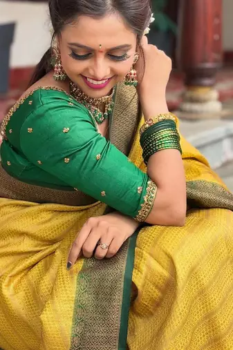Yellow silk blend banarasi saree with unstitched blouse piece