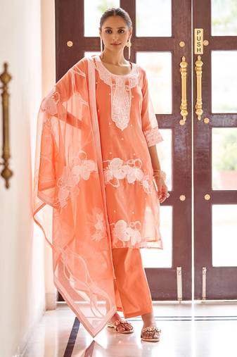 Orange ethnic motifs jacquard straight thread work kurta set
