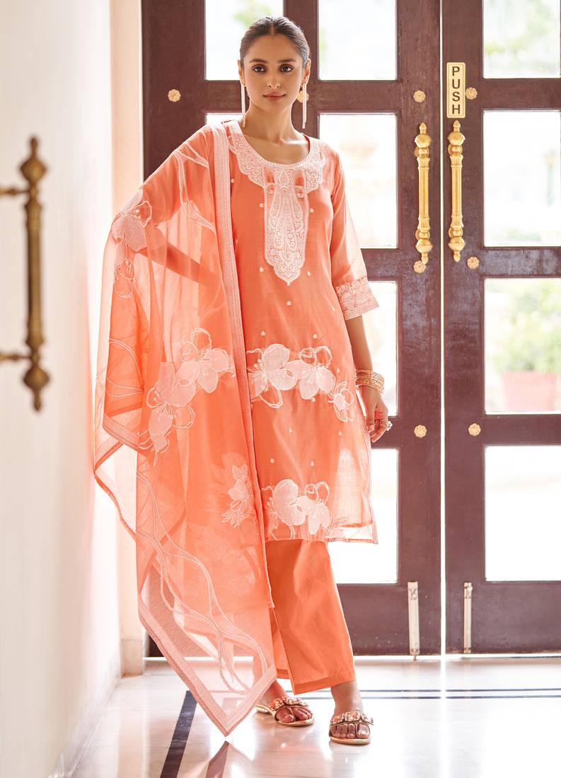 Orange ethnic motifs jacquard straight thread work kurta set