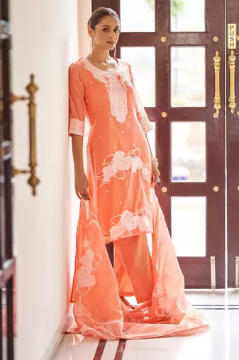 Orange ethnic motifs jacquard straight thread work kurta set