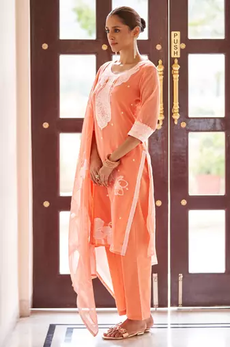 Orange ethnic motifs jacquard straight thread work kurta set