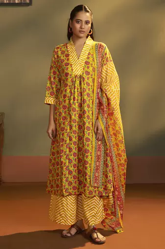 Women’s yellow cotton blend printed flared kurta with printed pant & chanderi printed dupatta