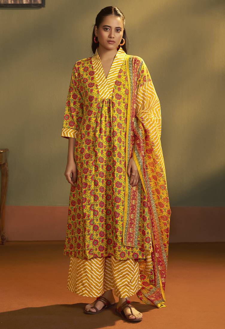 Women’s yellow cotton blend printed flared kurta with printed pant & chanderi printed dupatta