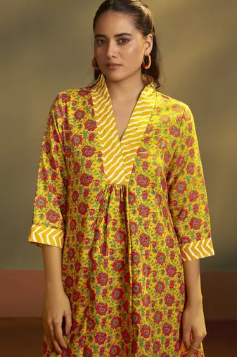 Women   s yellow cotton blend printed flared kurta with printed pant & chanderi printed dupatta