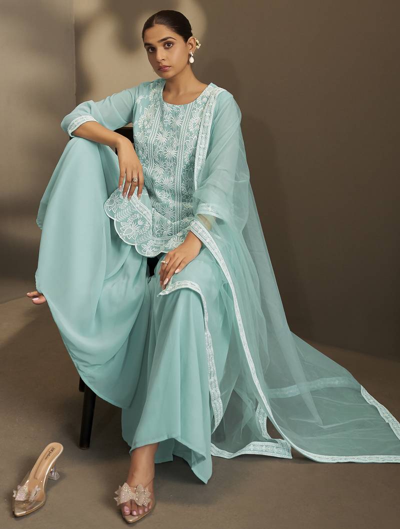 Women sky blue georgette schiffli embroidered straight kurta with sharara & net dupatta