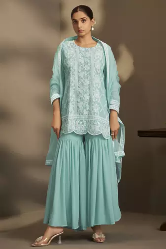 Women sky blue georgette schiffli embroidered straight kurta with sharara & net dupatta