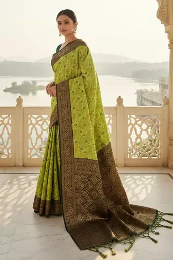 Lemon green silk blend banarasi saree with unstitched blouse piece