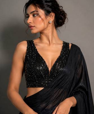 Black beads work shiny georgette partywear saree with full of beads work blouse fabric. 2