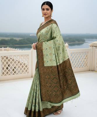 Pista green silk blend banarasi saree with unstitched blouse piece 1