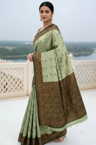 Pista green silk blend banarasi saree with unstitched blouse piece