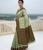 Pista green silk blend banarasi saree with unstitched blouse piece