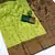Lemon green silk blend banarasi saree with unstitched blouse piece