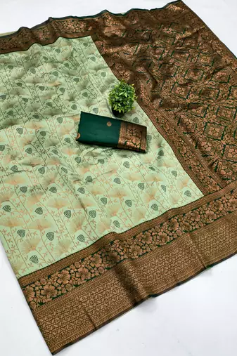 Pista green silk blend banarasi saree with unstitched blouse piece