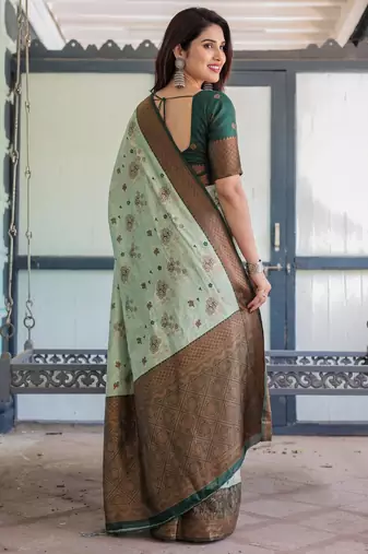 Pista green silk blend banarasi saree with unstitched blouse piece