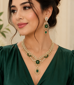 Gold finish electric green diamond necklace set