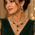 Gold finish electric green diamond necklace set