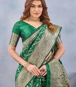 Green silk blend banarasi saree with unstitched blouse piece
