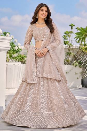 Luxury Beige Net Lehenga Choli with Allover Beads & Dori Embellishment