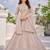 Luxury Beige Net Lehenga Choli with Allover Beads & Dori Embellishment