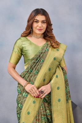 Light green silk blend banarasi saree with unstitched blouse piece 1