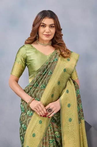 Light green silk blend banarasi saree with unstitched blouse piece