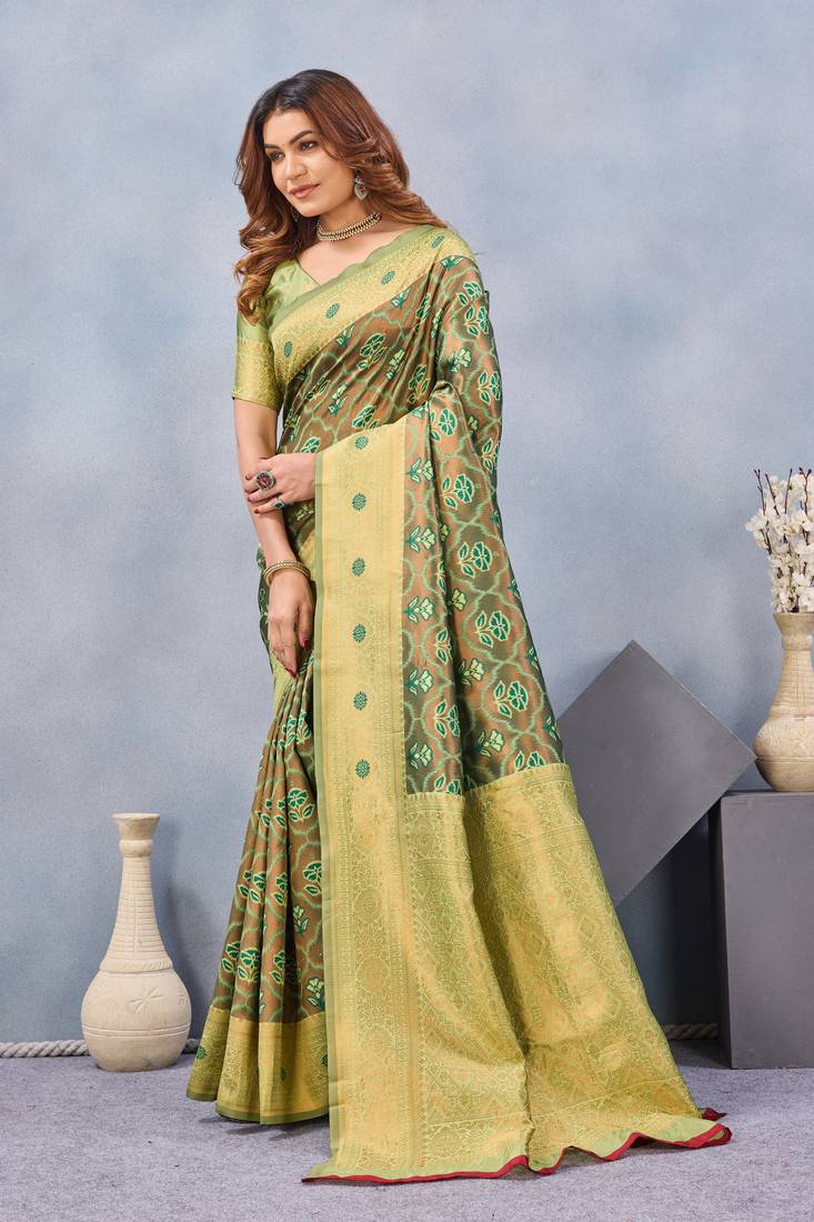 Light green silk blend banarasi saree with unstitched blouse piece