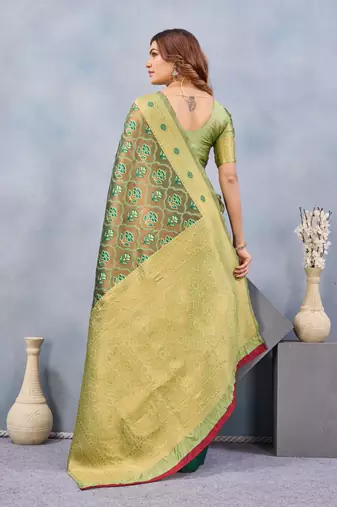 Light green silk blend banarasi saree with unstitched blouse piece