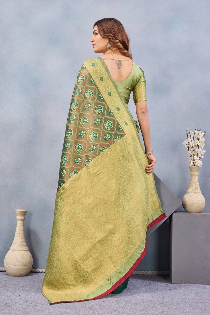 Light green silk blend banarasi saree with unstitched blouse piece