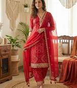 red bandhani print salwar suit set with net dupatta