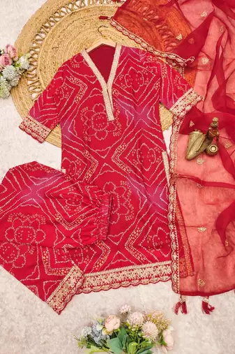 red bandhani print salwar suit set with net dupatta