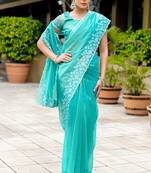 Turquoise gold-infused twill thread embroidery with zari, sequins cut work saree with blouse