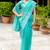 Turquoise gold-infused twill thread embroidery with zari, sequins cut work saree with blouse