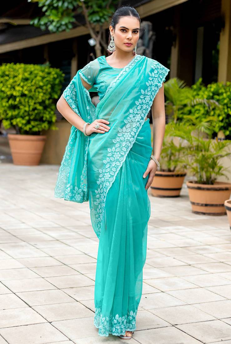 Turquoise gold-infused twill thread embroidery with zari, sequins cut work saree with blouse