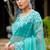 Turquoise gold-infused twill thread embroidery with zari, sequins cut work saree with blouse