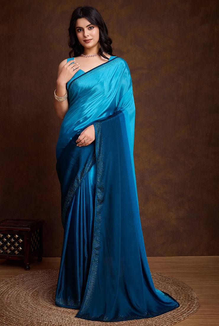 sky blue shaded chinon swarovski subtle piping border work saree with blouse