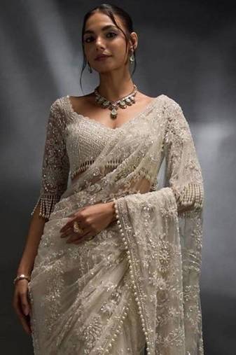 Off white net embroidered saree