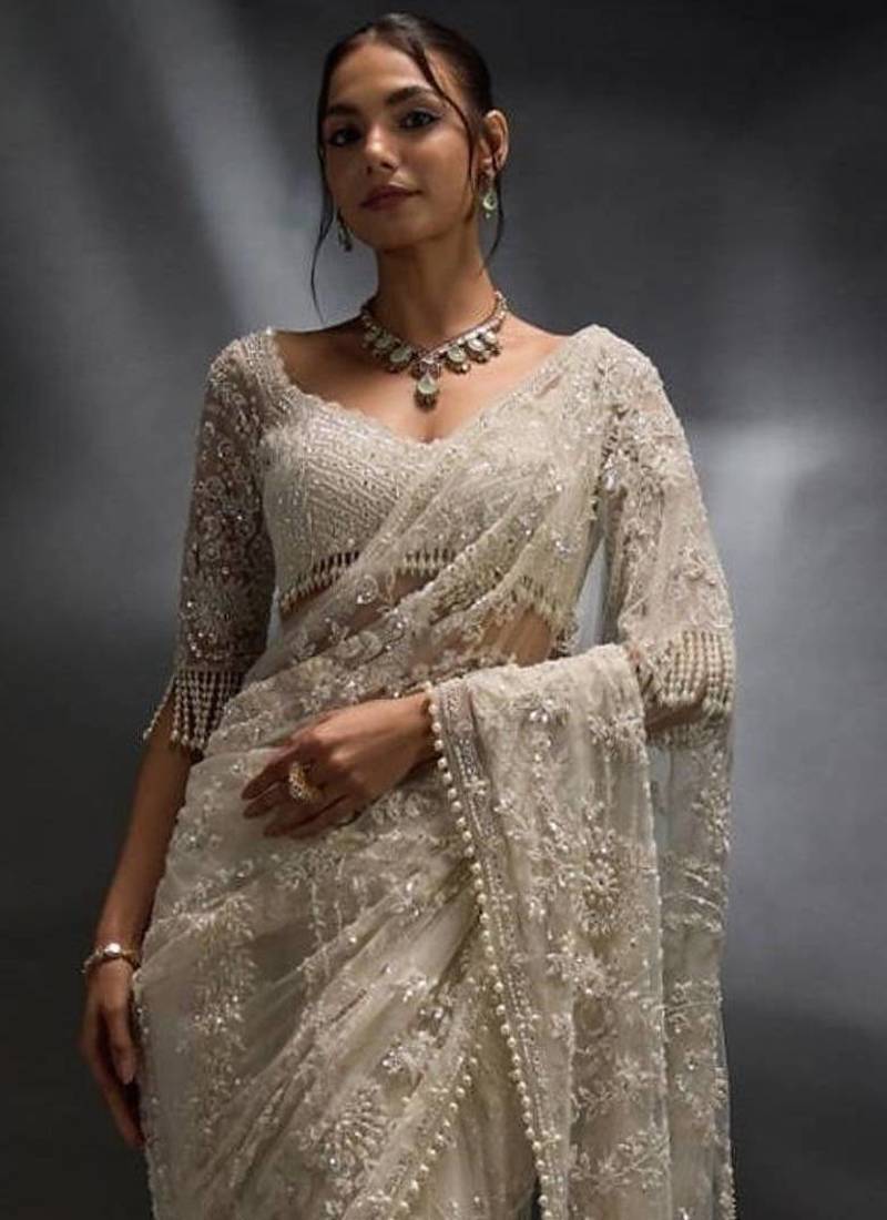 Off white net embroidered saree