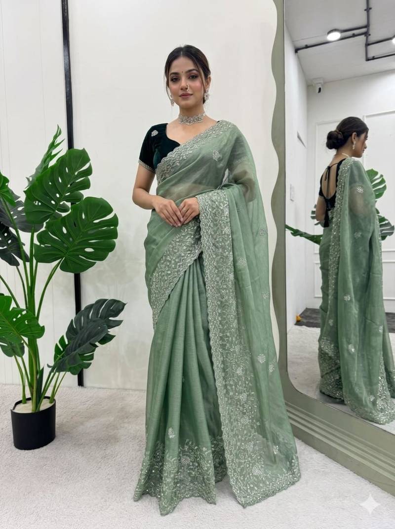 Sea green silk blend embroidered saree with thread work
