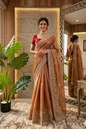 Orange silk blend embroidered saree with thread work
