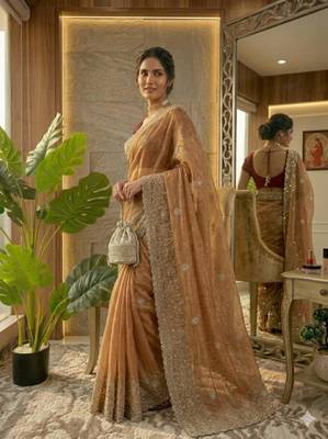 Orange silk blend embroidered saree with thread work 4