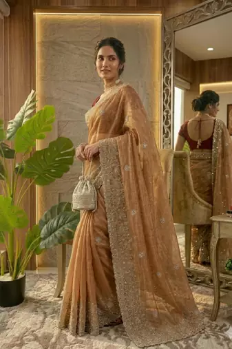 Orange silk blend embroidered saree with thread work