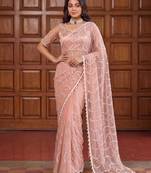 Beige net embroidered saree with sequins work