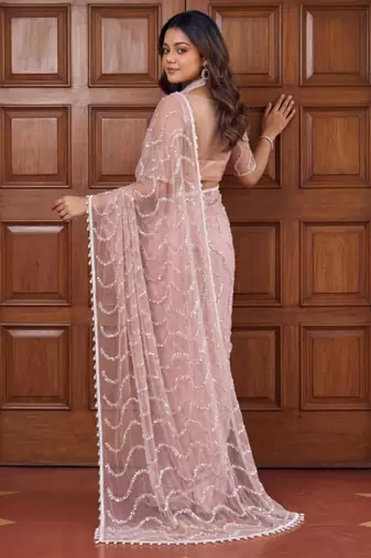 Beige net embroidered saree with sequins work