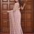 Beige net embroidered saree with sequins work