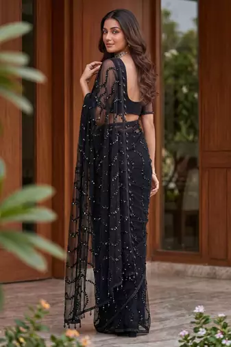 Black net embroidered saree with sequins work
