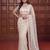 Cream net embroidered saree with sequins work