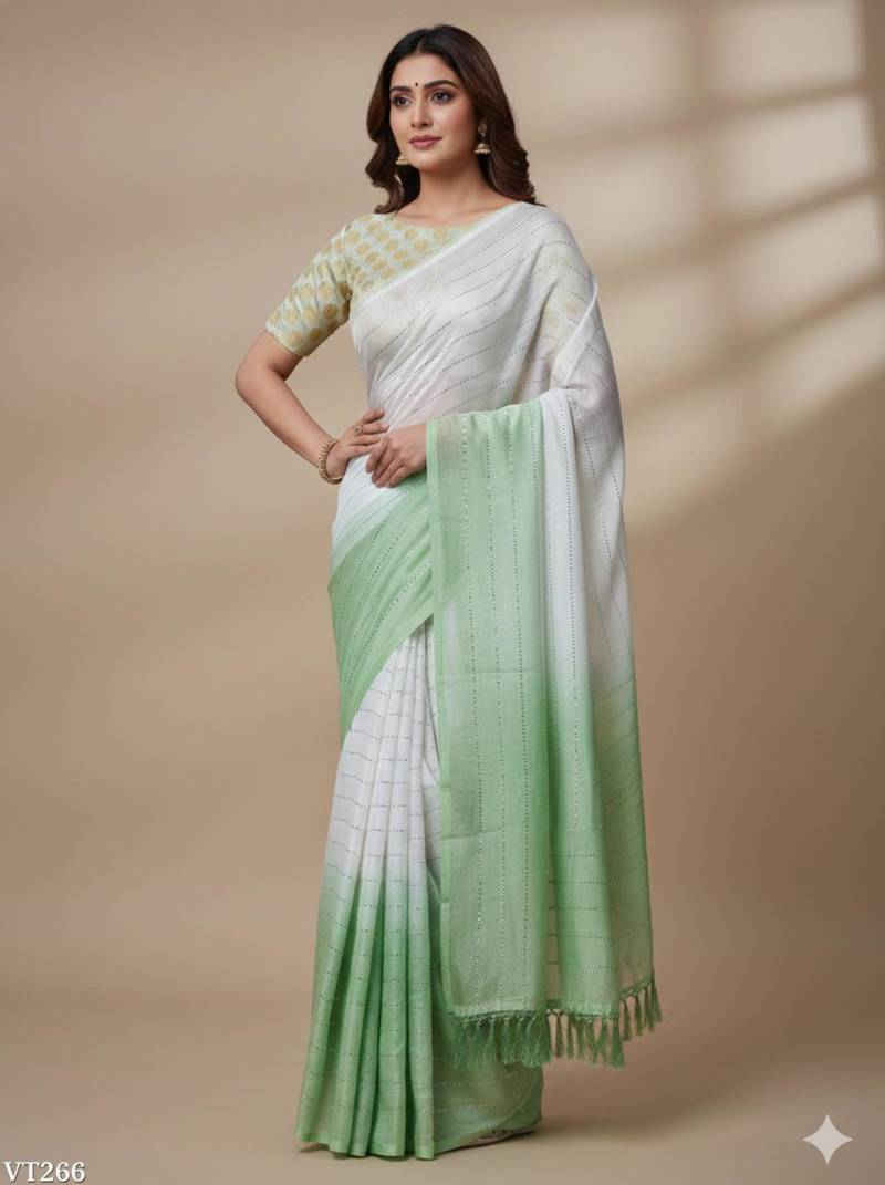Green silk blend printed saree with dots print
