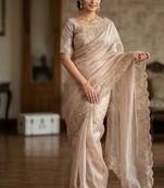 Beige silk blend embroidered saree with thread work