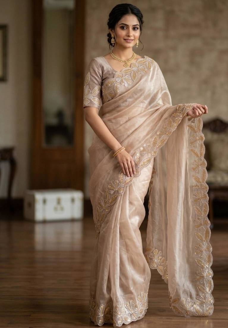 Beige silk blend embroidered saree with thread work